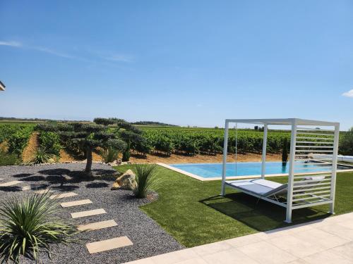 Villa vue exceptionnelleの敷地内または近くにあるプール