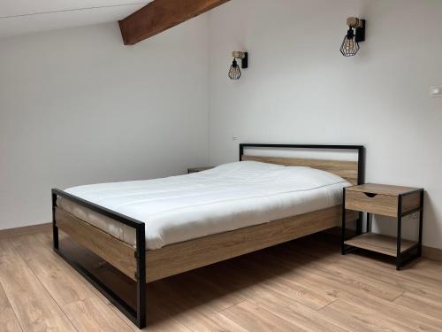 Ένα ή περισσότερα κρεβάτια σε δωμάτιο στο Maisonnette résidence Le Grand Bleu