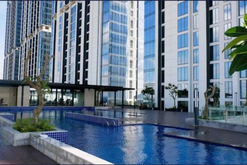 Swimmingpoolen hos eller tæt på COMFORTSTAY-Pollux Mall Batam Center TOWER B #3902