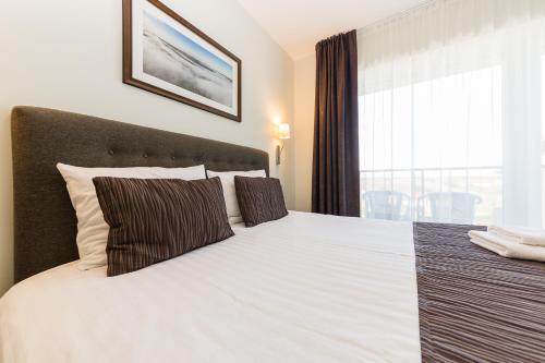 Katil atau katil-katil dalam bilik di Motel Panorama