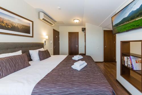 Katil atau katil-katil dalam bilik di Motel Panorama