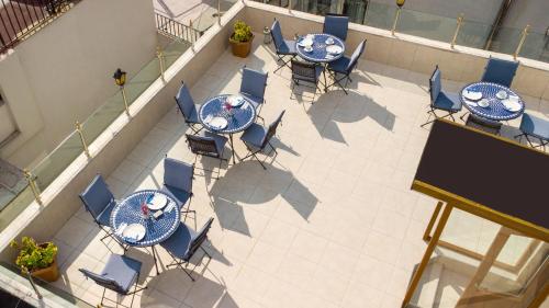 an overhead view of a patio with tables and chairs at Aldem Hotel in Istanbul