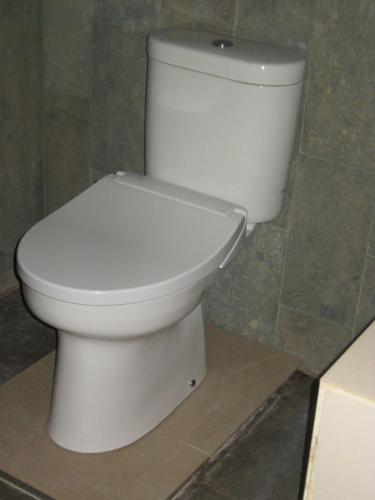 Ванная комната в Putra'Lebah Amed Guest House