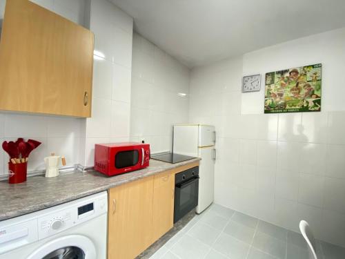 Η κουζίνα ή μικρή κουζίνα στο Itos Flats Pravia
