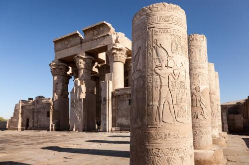 a pillar with relief on it in front of a building at Mövenpick Royal Lily Nile Cruise, Every Monday Four Nights From Luxor, Every Friday Three Nights From Aswan - Including Excursions & Sightseeing in Luxor