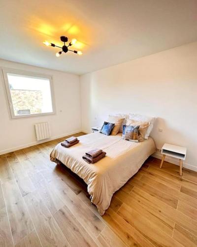 Ένα ή περισσότερα κρεβάτια σε δωμάτιο στο Extraordinary duplex apartment in Paris Montreuil