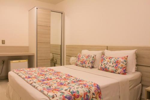 Katil atau katil-katil dalam bilik di Kristie Resort Natal Hotel