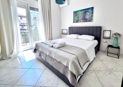 Katil atau katil-katil dalam bilik di Central 7 - stylish apartment