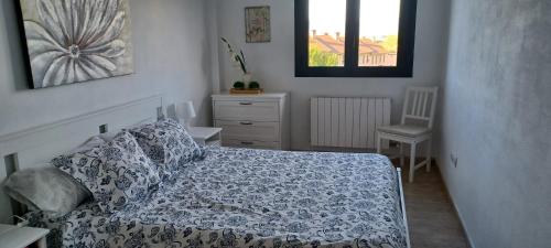 Ένα ή περισσότερα κρεβάτια σε δωμάτιο στο Loa Jaca