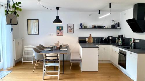 Η κουζίνα ή μικρή κουζίνα στο Weissach Apartments