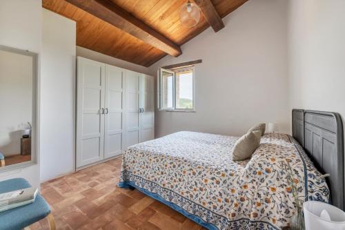 a bedroom with a bed and a television in it at Banditella in Orvieto
