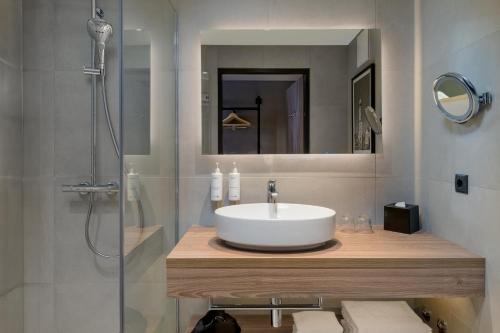 Salle de bains dans l'établissement Radisson Hotel Leipzig
