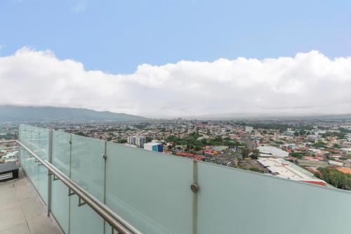 a view of a city from the top of a building at Skyline iFreses, 22nd floor! AC, TV and Pool in Guayabos