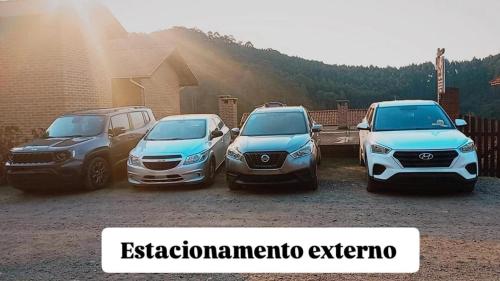 Foto da galeria de Chalés e suítes lima em Monte Verde