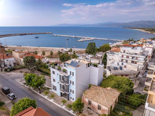 an aerial view of a city and a body of water at Magical Seaside Town Boutique Apts 2 in Kyparissia