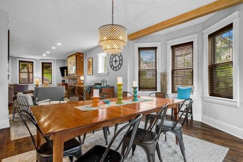 a dining room and living room with a table and chairs at Fantastic Family Home in Central Mount Washington in Pittsburgh