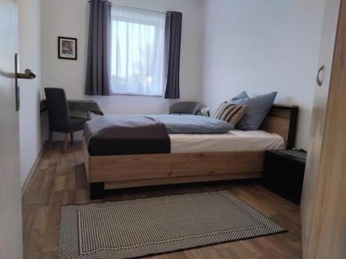 Postel nebo postele na pokoji v ubytování Apartment Fasching