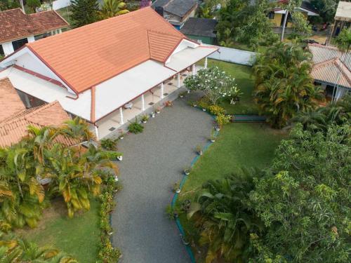 Κήπος έξω από το Araliya Villa Moragalla