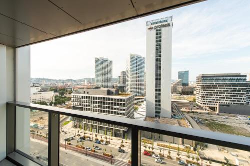 a view of the city from a building at Nikas Eurovea Apartments - free parking in Bratislava