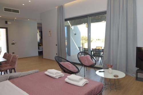 Ένα ή περισσότερα κρεβάτια σε δωμάτιο στο Paraga Luxury Villa