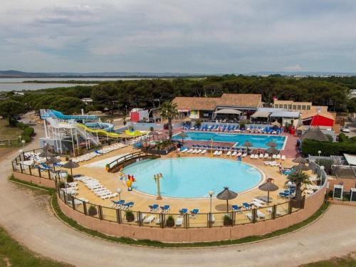 an aerial view of a pool at a resort at La cabane des rêves in Pérols