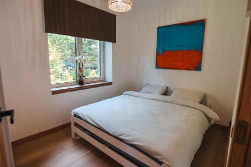 Postel nebo postele na pokoji v ubytování Home Stay Juniper