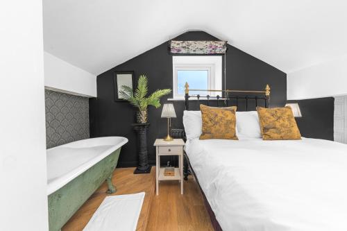 Ένα ή περισσότερα κρεβάτια σε δωμάτιο στο No.1 The Coach House