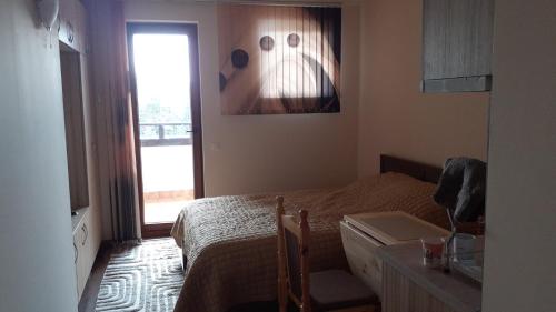 Televisyen dan/atau pusat hiburan di Hotel Grand Resor Pamporovo