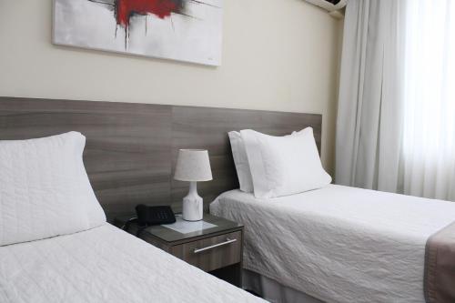 Hotel Acrópolisにあるベッド