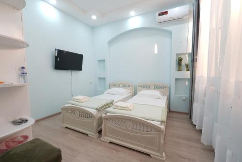 Телевизор и/или развлекательный центр в Dasht Guest House