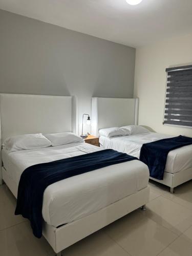 Postel nebo postele na pokoji v ubytování Depas & suites TOSVA