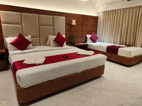 Katil atau katil-katil dalam bilik di Hotel Anand Palace