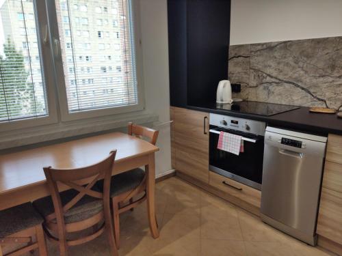 Kuchyňa alebo kuchynka v ubytovaní Apartment Jerzmanowskiego Krakow