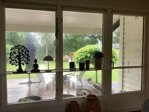 Κήπος έξω από το 4 star holiday home in HOLSLJUNGA