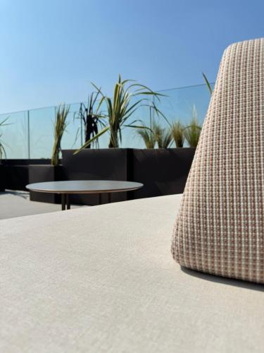 a pillow sitting on top of a table at Helios Hotel in Monza