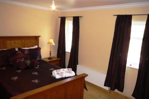 Ein Bett oder Betten in einem Zimmer der Unterkunft The Uplands