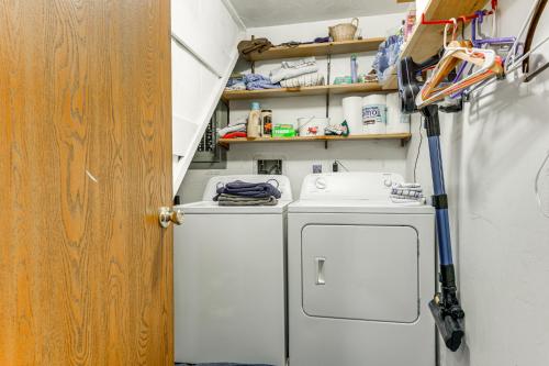 a laundry room with a washer and dryer in it at West Dover Townhome Hot Tub, 2 Mi to Mount Snow! in West Dover