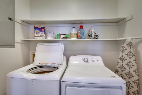 a washer and dryer in a small kitchen at Seneca Escape with Screened Patio Near Lakes! in Seneca