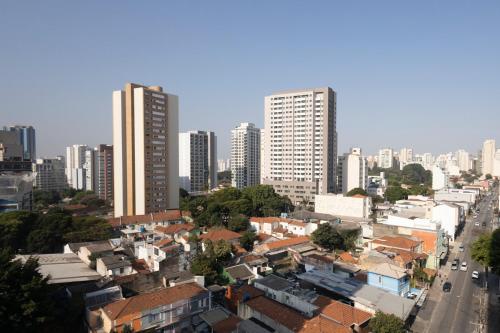 a view of a city with tall buildings at 360 VN Turiassú by Housi in Sao Paulo