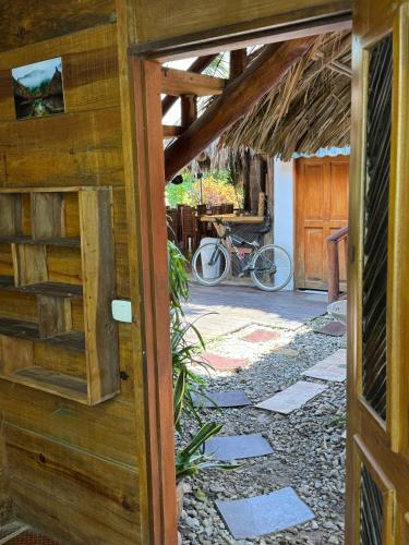 an open door to a building with a patio at Hostal Nibuni Palomino in Palomino