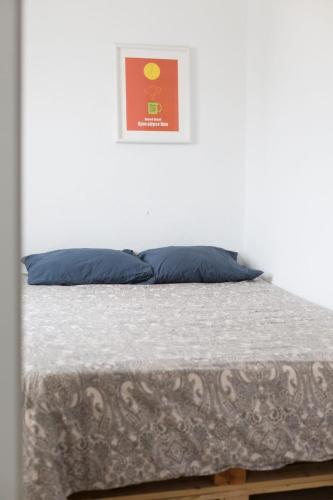 Ένα ή περισσότερα κρεβάτια σε δωμάτιο στο BackpackerRoom's