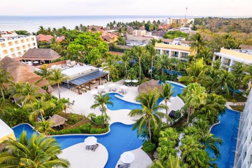 an aerial view of the resort and the ocean at Secrets Aura Cozumel - Adults Only in Cozumel