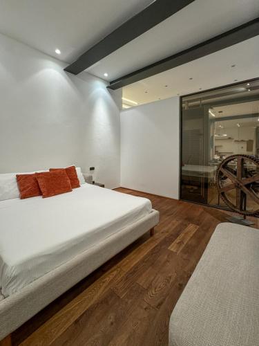 Loft Veratti by iCasamia itにあるベッド