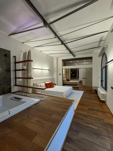 Loft Veratti by iCasamia itにあるベッド