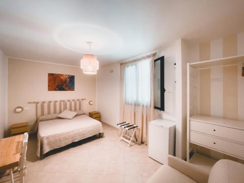 Postel nebo postele na pokoji v ubytování Notos b&b
