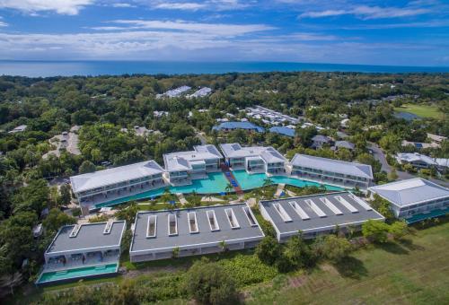 an aerial view of a resort with a swimming pool at Pool Resort Port Douglas in Port Douglas