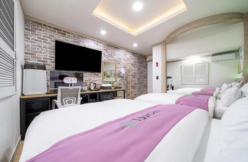 Postel nebo postele na pokoji v ubytování Soop Hotel