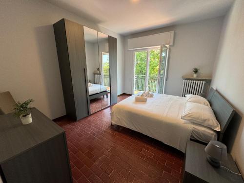 Postel nebo postele na pokoji v ubytování Adua Residence