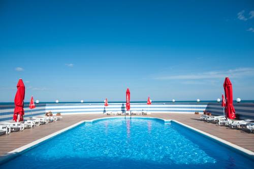 a swimming pool on the deck of a cruise ship at Hotel Lilia in Golden Sands