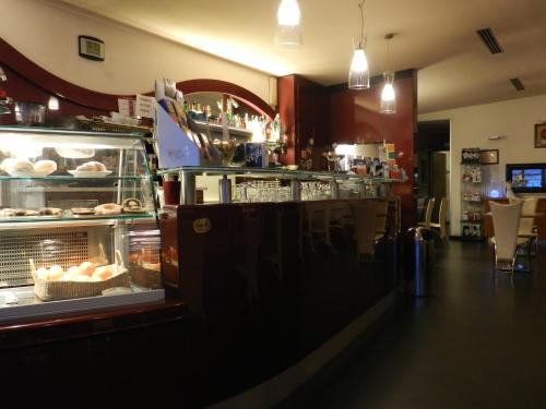 Lounge nebo bar v ubytování Locanda Trattoria Caffè Cavour